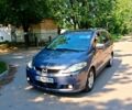Серый Мазда 5, объемом двигателя 2 л и пробегом 347 тыс. км за 3999 $, фото 1 на Automoto.ua