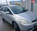 Серый Мазда 5, объемом двигателя 2 л и пробегом 226 тыс. км за 4800 $, фото 1 на Automoto.ua