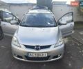 Серый Мазда 5, объемом двигателя 2 л и пробегом 295 тыс. км за 5650 $, фото 1 на Automoto.ua