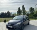 Серый Мазда 5, объемом двигателя 2 л и пробегом 376 тыс. км за 4700 $, фото 1 на Automoto.ua