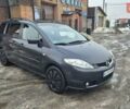 Серый Мазда 5, объемом двигателя 2 л и пробегом 203 тыс. км за 5500 $, фото 1 на Automoto.ua