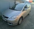 Серый Мазда 5, объемом двигателя 2 л и пробегом 200 тыс. км за 4700 $, фото 1 на Automoto.ua