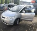 Серый Мазда 5, объемом двигателя 2 л и пробегом 295 тыс. км за 5650 $, фото 9 на Automoto.ua