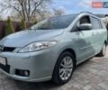 Серый Мазда 5, объемом двигателя 2 л и пробегом 190 тыс. км за 6300 $, фото 1 на Automoto.ua