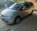 Серый Мазда 5, объемом двигателя 2 л и пробегом 339 тыс. км за 3100 $, фото 1 на Automoto.ua