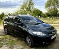 Серый Мазда 5, объемом двигателя 1.8 л и пробегом 255 тыс. км за 5450 $, фото 1 на Automoto.ua
