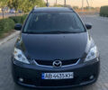 Серый Мазда 5, объемом двигателя 2 л и пробегом 223 тыс. км за 5700 $, фото 1 на Automoto.ua