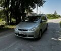 Серый Мазда 5, объемом двигателя 1.8 л и пробегом 321 тыс. км за 4499 $, фото 1 на Automoto.ua