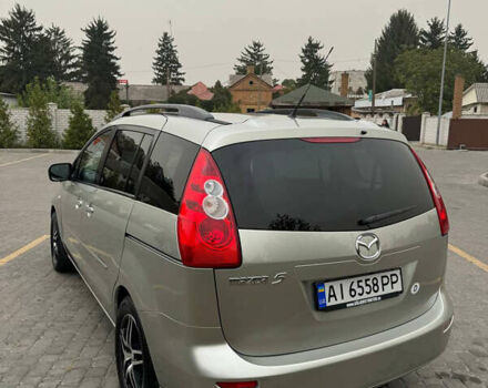 Серый Мазда 5, объемом двигателя 2 л и пробегом 210 тыс. км за 6800 $, фото 3 на Automoto.ua
