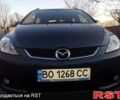 Серый Мазда 5, объемом двигателя 2 л и пробегом 180 тыс. км за 3800 $, фото 1 на Automoto.ua