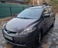 Серый Мазда 5, объемом двигателя 2 л и пробегом 270 тыс. км за 4800 $, фото 1 на Automoto.ua