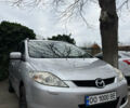 Серый Мазда 5, объемом двигателя 2 л и пробегом 257 тыс. км за 5700 $, фото 1 на Automoto.ua