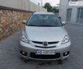 Серый Мазда 5, объемом двигателя 2 л и пробегом 297 тыс. км за 6550 $, фото 1 на Automoto.ua