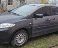 Серый Мазда 5, объемом двигателя 2.3 л и пробегом 230 тыс. км за 3500 $, фото 1 на Automoto.ua