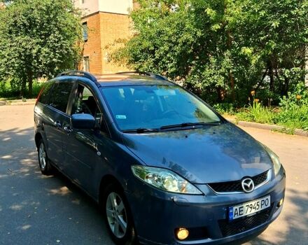 Серый Мазда 5, объемом двигателя 2 л и пробегом 347 тыс. км за 3999 $, фото 1 на Automoto.ua