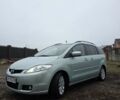 Серый Мазда 5, объемом двигателя 2 л и пробегом 286 тыс. км за 4300 $, фото 1 на Automoto.ua
