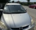Серый Мазда 5, объемом двигателя 2 л и пробегом 200 тыс. км за 1600 $, фото 1 на Automoto.ua