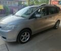 Серый Мазда 5, объемом двигателя 2 л и пробегом 324 тыс. км за 4000 $, фото 1 на Automoto.ua