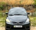 Серый Мазда 5, объемом двигателя 2.3 л и пробегом 257 тыс. км за 5700 $, фото 1 на Automoto.ua