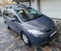 Серый Мазда 5, объемом двигателя 2 л и пробегом 230 тыс. км за 5100 $, фото 1 на Automoto.ua
