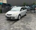 Серый Мазда 5, объемом двигателя 2 л и пробегом 226 тыс. км за 3350 $, фото 1 на Automoto.ua