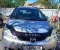 Серый Мазда 5, объемом двигателя 2 л и пробегом 264 тыс. км за 4799 $, фото 1 на Automoto.ua