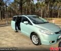 Серый Мазда 5, объемом двигателя 2 л и пробегом 218 тыс. км за 4400 $, фото 2 на Automoto.ua