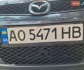 Серый Мазда 5, объемом двигателя 2 л и пробегом 270 тыс. км за 4100 $, фото 1 на Automoto.ua