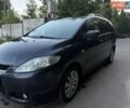 Серый Мазда 5, объемом двигателя 2 л и пробегом 394 тыс. км за 4000 $, фото 1 на Automoto.ua