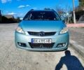 Серый Мазда 5, объемом двигателя 2 л и пробегом 199 тыс. км за 4900 $, фото 1 на Automoto.ua