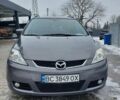 Серый Мазда 5, объемом двигателя 2 л и пробегом 282 тыс. км за 4000 $, фото 1 на Automoto.ua
