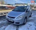 Серый Мазда 5, объемом двигателя 2 л и пробегом 207 тыс. км за 6300 $, фото 1 на Automoto.ua