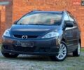 Серый Мазда 5, объемом двигателя 2 л и пробегом 280 тыс. км за 4250 $, фото 1 на Automoto.ua