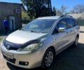 Серый Мазда 5, объемом двигателя 2 л и пробегом 100 тыс. км за 5999 $, фото 1 на Automoto.ua