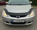 Серый Мазда 5, объемом двигателя 2 л и пробегом 210 тыс. км за 6800 $, фото 1 на Automoto.ua