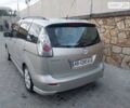 Серый Мазда 5, объемом двигателя 2 л и пробегом 297 тыс. км за 6550 $, фото 2 на Automoto.ua