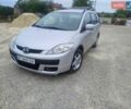 Серый Мазда 5, объемом двигателя 2 л и пробегом 210 тыс. км за 4499 $, фото 1 на Automoto.ua