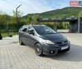 Серый Мазда 5, объемом двигателя 2 л и пробегом 376 тыс. км за 4700 $, фото 2 на Automoto.ua