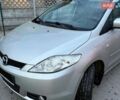 Серый Мазда 5, объемом двигателя 2 л и пробегом 288 тыс. км за 4900 $, фото 1 на Automoto.ua