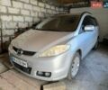 Серый Мазда 5, объемом двигателя 2 л и пробегом 163 тыс. км за 6000 $, фото 1 на Automoto.ua