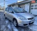 Серый Мазда 5, объемом двигателя 2 л и пробегом 207 тыс. км за 6300 $, фото 3 на Automoto.ua