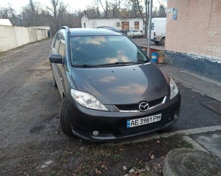 Серый Мазда 5, объемом двигателя 2 л и пробегом 250 тыс. км за 5000 $, фото 1 на Automoto.ua