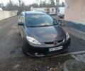 Серый Мазда 5, объемом двигателя 2 л и пробегом 250 тыс. км за 5000 $, фото 1 на Automoto.ua
