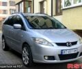 Серый Мазда 5, объемом двигателя 2 л и пробегом 240 тыс. км за 5800 $, фото 1 на Automoto.ua