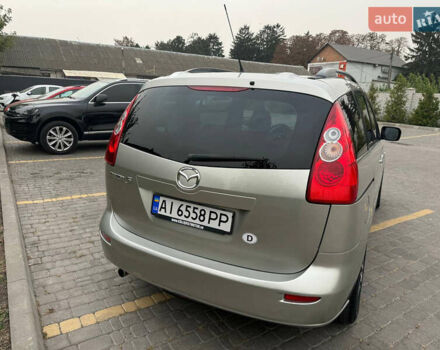Серый Мазда 5, объемом двигателя 2 л и пробегом 210 тыс. км за 6800 $, фото 4 на Automoto.ua