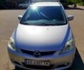 Серый Мазда 5, объемом двигателя 1.8 л и пробегом 251 тыс. км за 5500 $, фото 1 на Automoto.ua