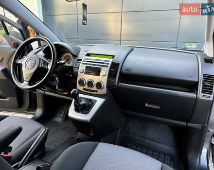 Серый Мазда 5, объемом двигателя 2 л и пробегом 256 тыс. км за 5599 $, фото 77 на Automoto.ua