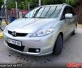 Серый Мазда 5, объемом двигателя 2 л и пробегом 257 тыс. км за 6500 $, фото 1 на Automoto.ua