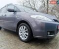 Сірий Мазда 5, об'ємом двигуна 1.8 л та пробігом 235 тис. км за 5800 $, фото 1 на Automoto.ua