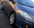 Серый Мазда 5, объемом двигателя 1.8 л и пробегом 255 тыс. км за 6500 $, фото 1 на Automoto.ua